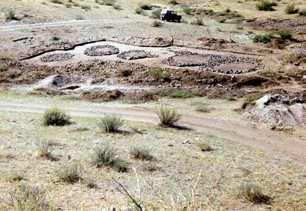 Scythian burial mounds, made of stones, which have been revealed at an archaeological dig site