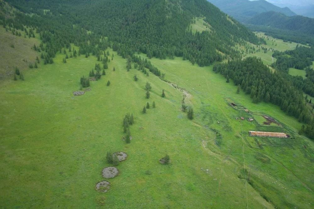 Grey stone burial mounds on a hillside